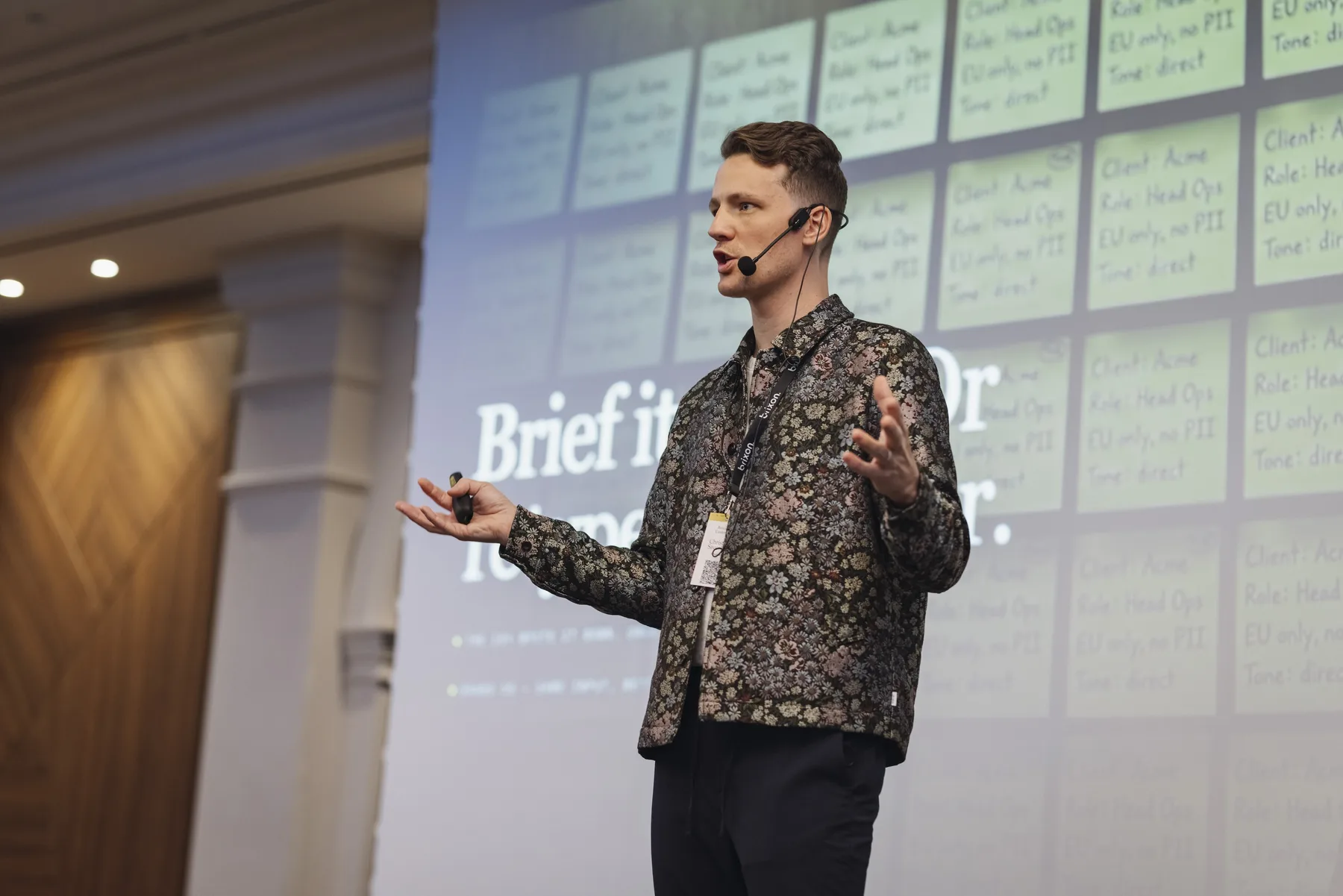 Christoph Sauerborn speaking in front of a slide with agent briefing notes.
